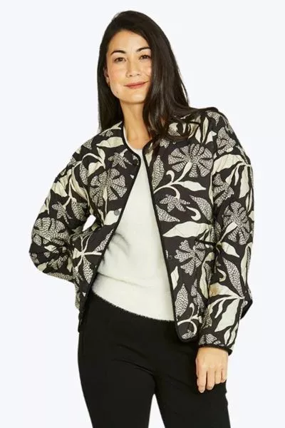 Complete your look with a layer that balances artistic flair with practical comfort. The Scandi Mono Jacket from Jump is a standout addition to your wardrobe, featuring the exclusive botanical motif in a bold black and stone palette. Crafted from a premiu