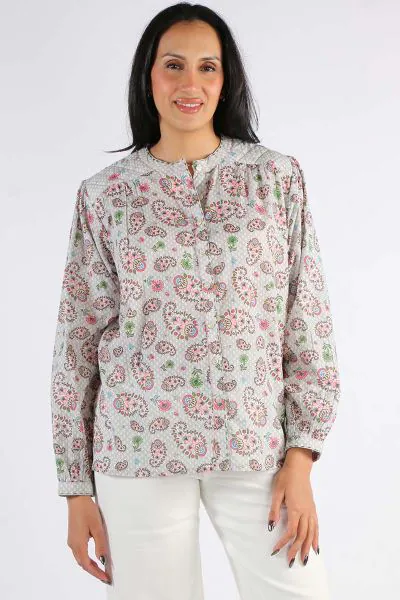 Go for a fun floral shirt this season by Mandalay. In a floral and paisley pattern, the shirt with mandarin collar and top stitch details along the placket. The quilted printed details on shoulder and slight gathered details finish of the look. Style with