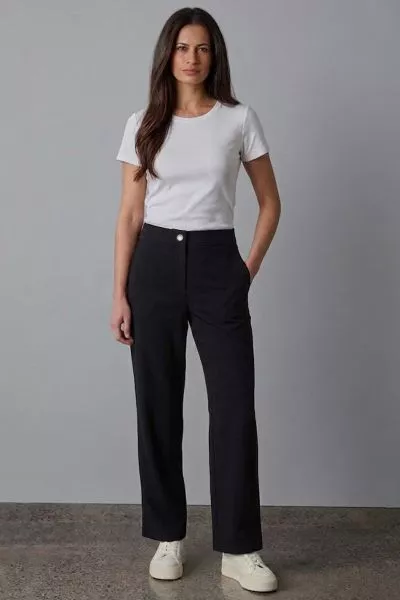 The Origin Pant is a timeless straight leg style crafted from a wool blend suiting. Featuring a fitted waistband with fly opening, it delivers a flattering silhouette and versatile elegance. Perfect for pairing with the Origin Jacket or knitwear.