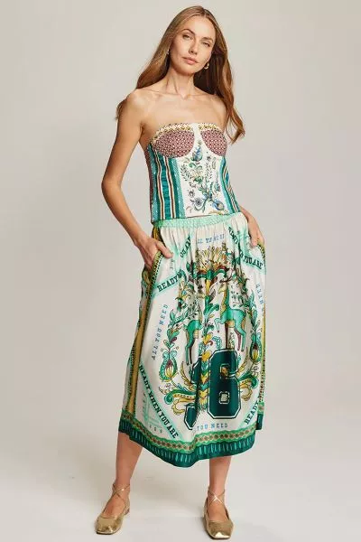 The Vanessa Sporty Jade Midi Skirt brings effortless femininity with a touch of playfulness. Designed with an easy elastic waistband, this fluid viscose piece moves beautifully and features ME369 s vibrant multi green print. Perfect on its own or paired w