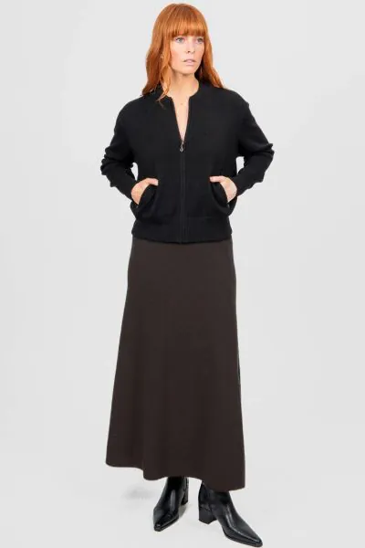 Introducing the new Flared Skirt with Wide Band, a timeless addition to your wardrobe that effortlessly blends classic silhouette and modern comfort. Crafted with meticulous attention to detail, this skirt features a flattering flared cut that drapes beau