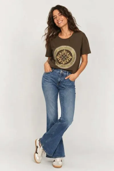 The Cynthia Galleon Jeans from Mos Mosh are a beautifully cut flared jean designed to flatter and elongate the silhouette. Crafted in a classic mid blue wash, they sit comfortably on the waist with a smooth fit through the hip and thigh before falling int