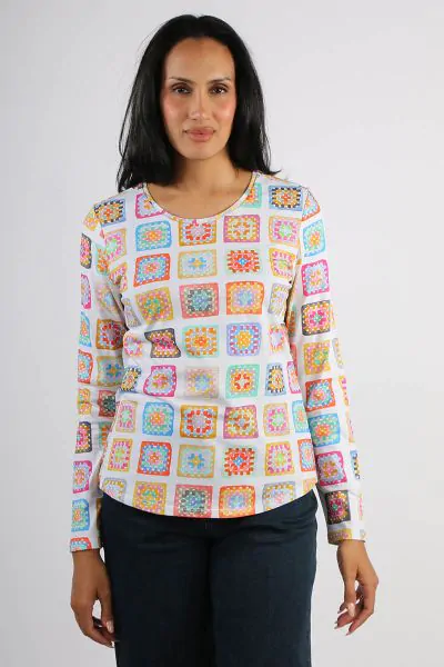 An easy tee elevated by Foil is a perfect choice for the season. In an overall fun print, the cotton jersey tee with round neck and full sleeves keeps things fun and flirty. Style FO7794.
