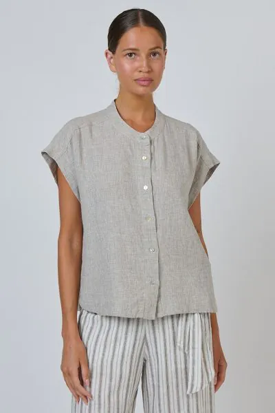 Feel confident and stylish in the GA429 shirt. Designed with a modern, relaxed fit, it features a unique band collar and cap sleeves for a cool, breezy feel in warmer weather. The back is styled with a subtle pleated detail, while the button down front ma
