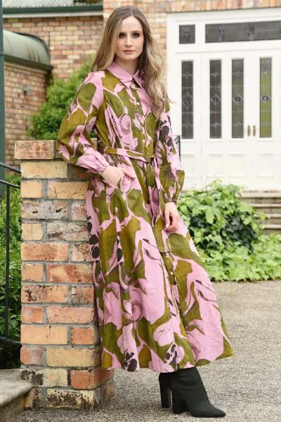 Bold greens and pinks bring vibrant energy to the GOOD SERVE Dress, making it a true standout. Crafted in FIRST BLUSH linen and cotton blend, this button through style features gathered sleeves with elasticated cuffs and a removable self-fabric tie for ve