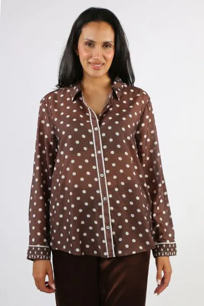 Classic pattern meets modern ease in the Spot Print Shirt, a lightweight, beautifully draped piece designed to elevate everyday dressing. Crafted from a soft, airy fabric, it offers effortless movement and a relaxed yet refined silhouette. Featuring a cla