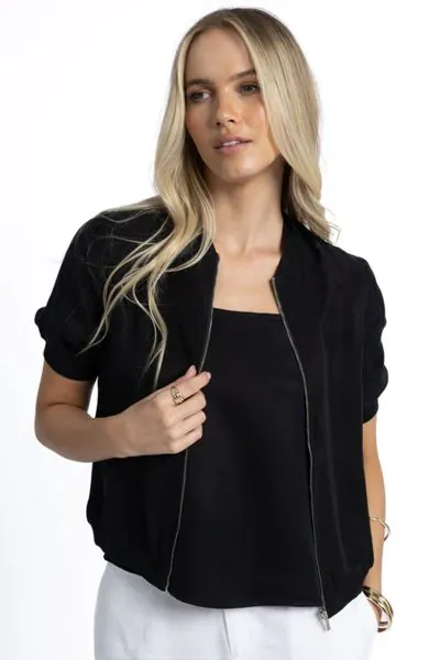 Add a bit of fun layer to your everyday look with this Harper Jacket. In a Cupro viscose blend, the crop jacket with a zip front has short sleeves and easy vibes. Style it over tanks and tees with minimal fuss. Style HS25212.
