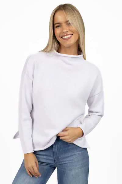 The Divine Jumper is a lightweight, go to knit for everyday comfort and casual style. Crafted from 100% cotton, this piece features a softly rolled funnel neck, side splits and curved hem that give it a flattering, effortless shape. A great base for layer