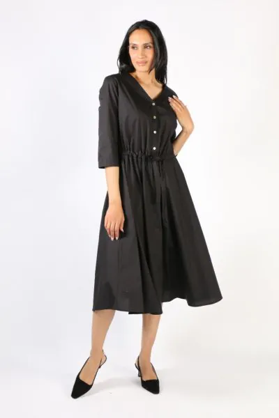 Step out in style with this illium circle dress. In a solid color, this dress with button front, v neck and cinches your waist perfectly. Hugging you in all the right places, it has 3/4 sleeves and side pockets and falls at a perfect tea length. Style thi