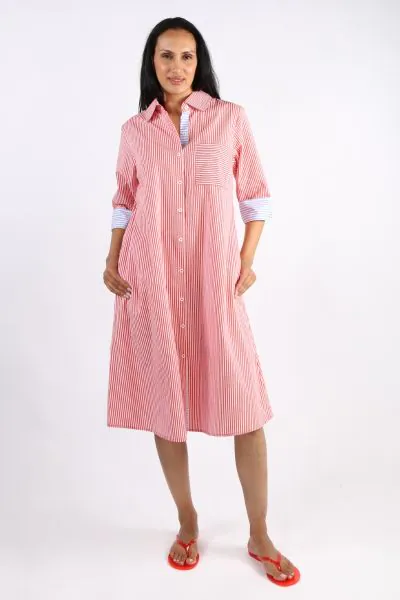 A classic shirt dress is hard to beat and this Harvey dress is one for the wardrobe staple. In a fun stripe color, it features a top to bottom button through closure with a collar and full cuffed sleeves with a black color under cuff. In a midi length, th