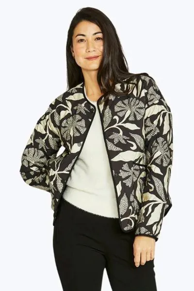 Complete your look with a layer that balances artistic flair with practical comfort. The Scandi Mono Jacket from Jump is a standout addition to your wardrobe, featuring the exclusive botanical motif in a bold black and stone palette. Crafted from a premiu
