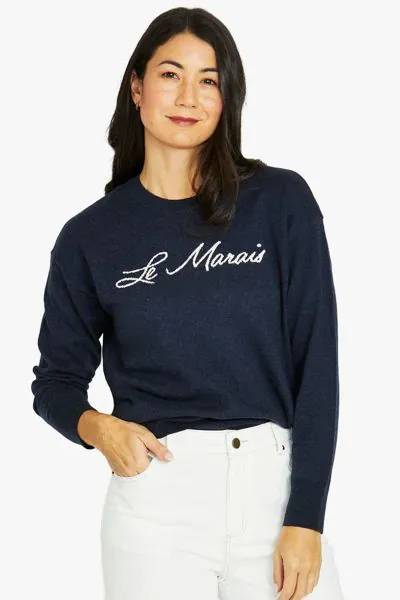 Introducing the Le Marais Pullover, perfect for layering or solo wear. The Le Marais Pullover offers a classic yet contemporary look with its simple design, comfortable fit and chic intarsia knit text. The silhouette is relaxed, providing ease of movement