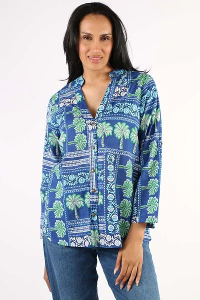 The easy and everyday shirt gets a major upgrade in this Catira Shirt By Lula Life. In an overall striking printed cotton, the shirt has a classic collared look with front button closure and long sleeves with tab details for styling options more than your