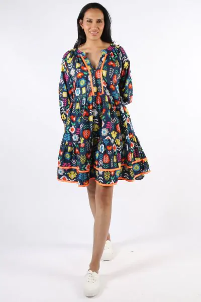 A fun dress for the summer vibes, Kalina dress makes a perfect case to have fun with fashion. In an overall print, the flirty dress has round split neck, gathered peasant sleeves and tiered design sashaying with every move. Finished with a contrasting tri