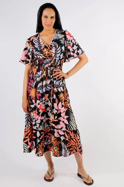 A sleek approach to summer dressing this season, Yohana dress by Lula Life is the dress for you. In an overall floral printed cotton, the dress has a V neck, 3/4 sleeves, with a smocked waist hugging you in all the right places. Finished with ruffled slee