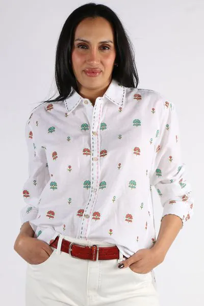 Your classic summer shirt gets a Mandalay Makeover this season in this Flower Shirt. The white linen shirt features an overall embroidered florals and stitched trim, classic collar and long sleeves. Style with easy cotton pants or denim shorts. Style 009.
