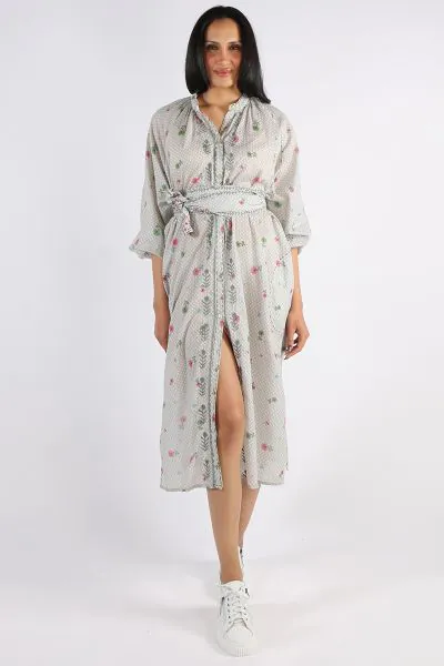 Easy dress gets a Mandalay treatement. In an overall floral print, along with embroidered details, this easy dress in easy cotton has gathered details, long sleeves and keeps you cool and breezy. Style with easy sneakers. Belt not included. Style SS25002.
