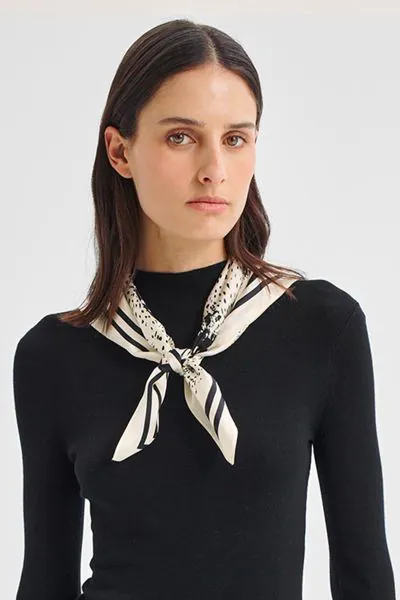 Elevate your look with this luxurious silk crepe satin scarf, crafted from 100% silk for a soft, fluid drape. Featuring an exclusive Morrison print, it adds a refined statement to any outfit.A2931.

