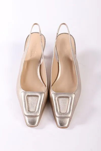 Made from soft suede leather in trendy colour, these slingback pumps evoke a sense of classic glamour. Shaped to flattering pointed toes, they are decorated with an eye-catching buckle trim at the vamp fitted between three leather straps. They are set ato