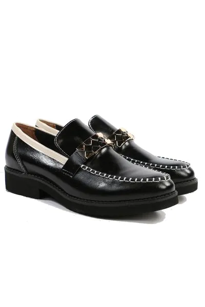 Round toe loafer made in leather with contrast top stitching. featuring a metal accent and contrast trim. Light, flexible and non slip rubber sole. style 242033.
