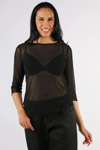 Be on top of sheer trend this season in this Sia Top By Two By Two. The easy sheer top gives you a perfect edge to be paired with easy tank or bra let. With a round neck and 3/4 sleeves, style it with high waisted pants and an easy blazer. Style 1921.
