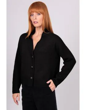 A Boxy fit relaxed cardigan with ribbed shawl collar and detailed, cable panel feature. Dropped shoulders for an easy to wear, relaxed look. High hip length. The collar can be worn high or folded for a roll collar effect. Horn-look buttons for a stylish f