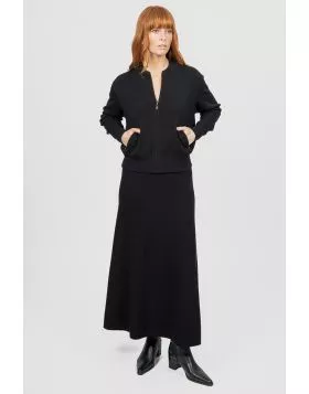 Introducing the new Flared Skirt with Wide Band, a timeless addition to your wardrobe that effortlessly blends classic silhouette and modern comfort. Crafted with meticulous attention to detail, this skirt features a flattering flared cut that drapes beau