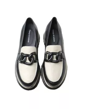Go bold with these leather plaform loafers by Django and Juliette. EAILA transforms a traditional silhouette with a larger than life sole that elevates any outfit.
