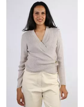 A perfect cardigan that gives you many styling options, this Wrap Cardi by Foil is a perfect one. In an easy cotton blend, the long sleeve cardi with a V neck can be styled front open or wrapped around with a button closure on the side. The Classic Ribbed