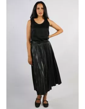 Elevate your style with the Florence Pleat Skirt, a timeless piece that effortlessly blends elegance and edge. Crafted from a soft faux leather fabric, this skirt features finely pressed pleats that create beautiful movement with every step. The midi leng