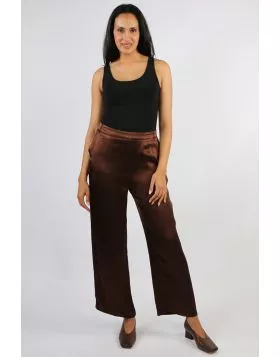 Sleek, fluid, and sophisticated, the Opera Wide Leg Pant brings effortless glamour to any occasion. Crafted from a soft satin fabric with a beautiful drape and subtle sheen, these pants offer a high rise fit and a relaxed wide leg silhouette that flatters