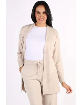 Go for an easy relaxed style with this longline cardigan by Jump. In a long length, the cardi with front button closure, features two front pockets and full sleeves. Finished with ribbed trim, this can be style over easy basics for an elevated look.