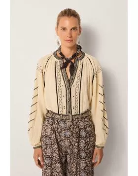 An effortlessly charming shirt by Maison Hotel is a perfect go to for the season. The Ringo Shirt in Crinkle Cotton features an overall striking embroidery and front open neck with front button and full sleeves. Style with easy wide leg pants for an easy 