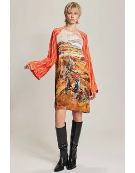 Our Alani dress is a mini with a rounded neck, long loose sleeves, pleats and a button closure in the back. Dress it up or down for a feminine, vibrant look.
