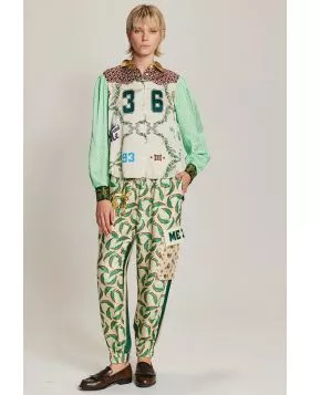 Gianna cargo pants come in our Sporty Jade and Rodeo patterns. There are two side pockets and two large pockets at the knee. Elastic waist. The Sporty Jade pattern has a leaf motif on the front and stripes on the back. Pair with our Grace Shirt for a femi