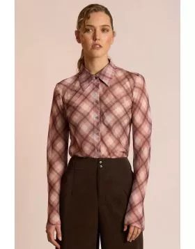 The Edgy Shirt by Neris is an elegant, elevated style crafted with a modern twist. Cut on the bias for a beautifully fluid drape, it features a classic collar and button up front. Raw edging at the hem and sleeves gives the shirt its signature attitude ba