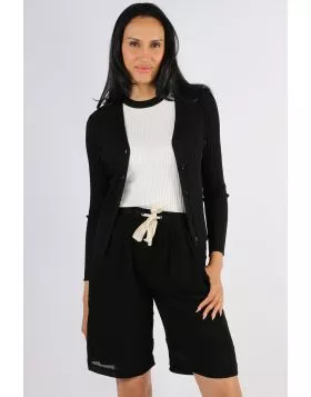 Hugging you in all the right places, flaunt self in this Mia Cardigan by Two by Two. The ribbed skinny fit cardi has long sleeves, V neck and button up front. Style with easy pants and over easy dresses. Style KN1018.

