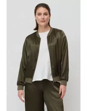The After Hours Bomber is a relaxed fit jacket crafted from lustrous viscose with a subtle sheen for a modern edge. Designed in a classic bomber silhouette with a ribbed neckband and cuffs, functional front pockets and a zip through front, it is an effort